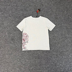 Derschutze Heather‑Off‑White Waffle‑Knit Plum‑Blossom Tree Side‑Print Tee