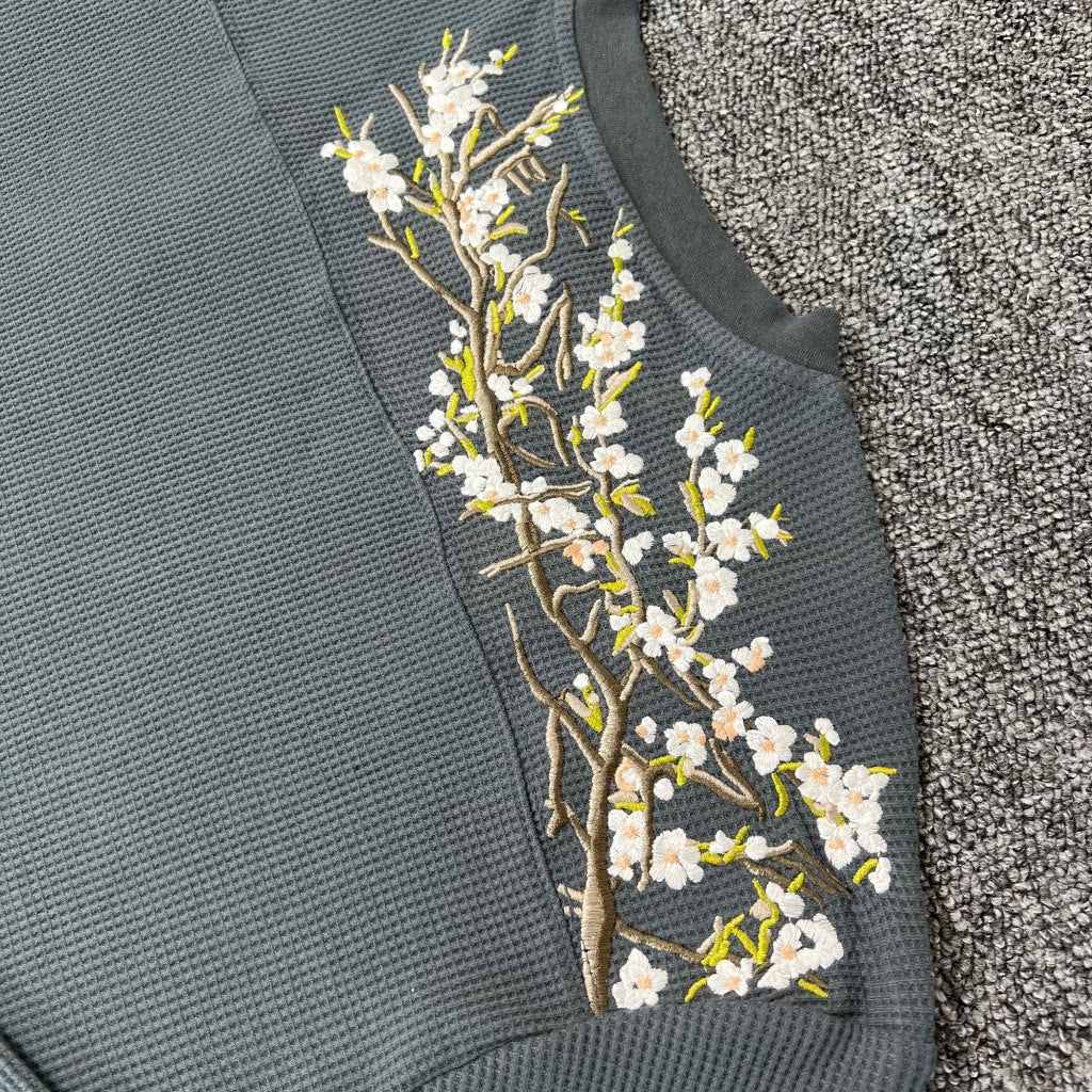Derschutze Dark‑Grey‑Green Waffle‑Knit White‑Blossom Branch Back‑Shoulder Print Long‑Sleeve Top