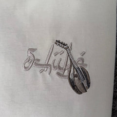 Derschutze Cream Middle Eastern Scholar Musician Back‑Print Graphic Tee